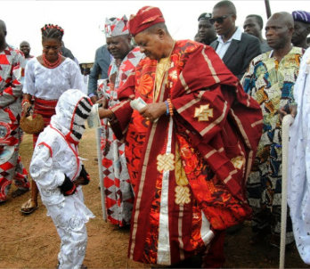 man giving a child money