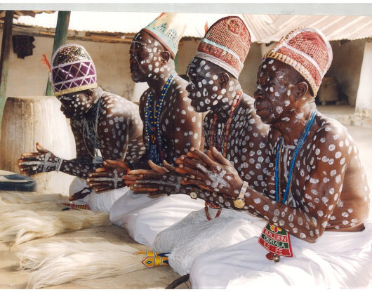 group of men praying